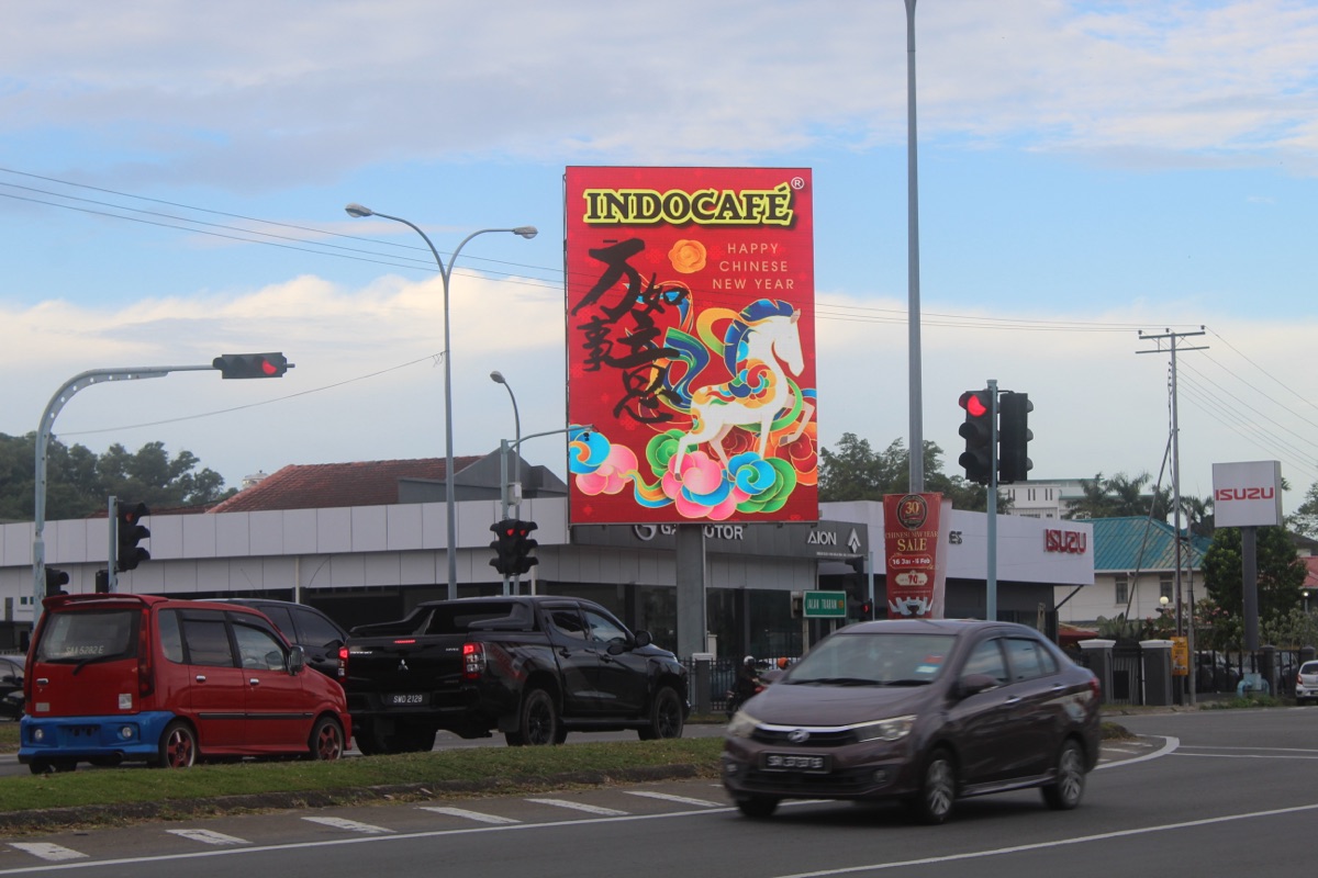 PCSB vertical LED Billboard in Sandakan with Indocafé CNY advertisement